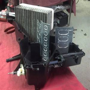 Rebuilt blend doors in a heater case.